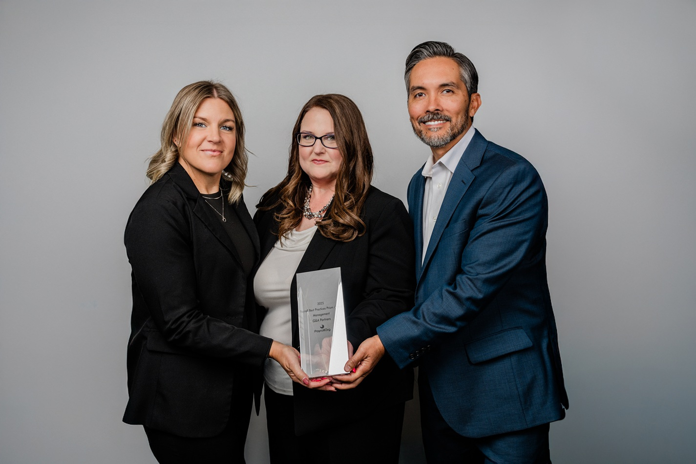 G&A Partners payroll leaders accept 2025 PayrollOrg Prism Award