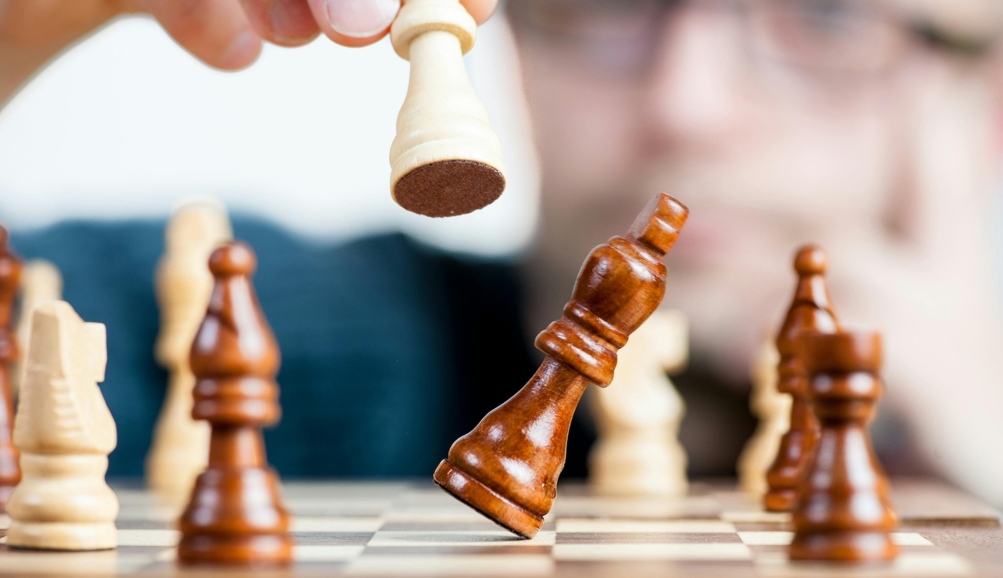 Close-up of a man playing chess