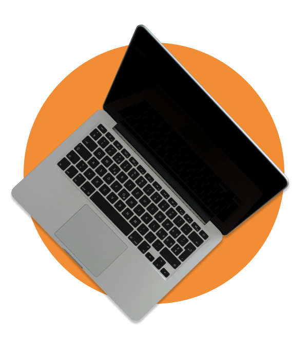 A silver laptop with a dark screen set against an orange circular backdrop.