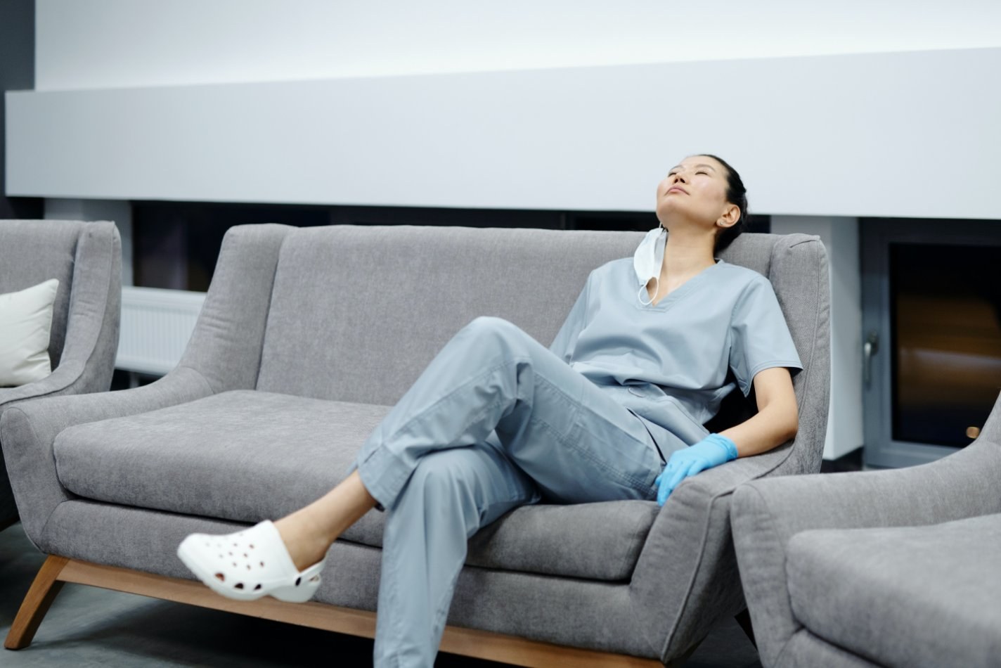 Nurse sitting on a couch