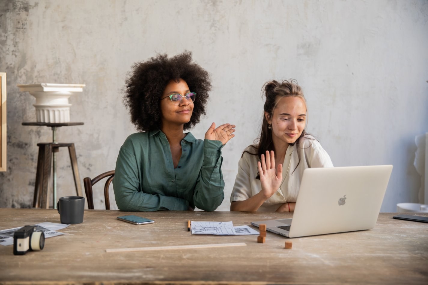 Two people on a virtual meeting