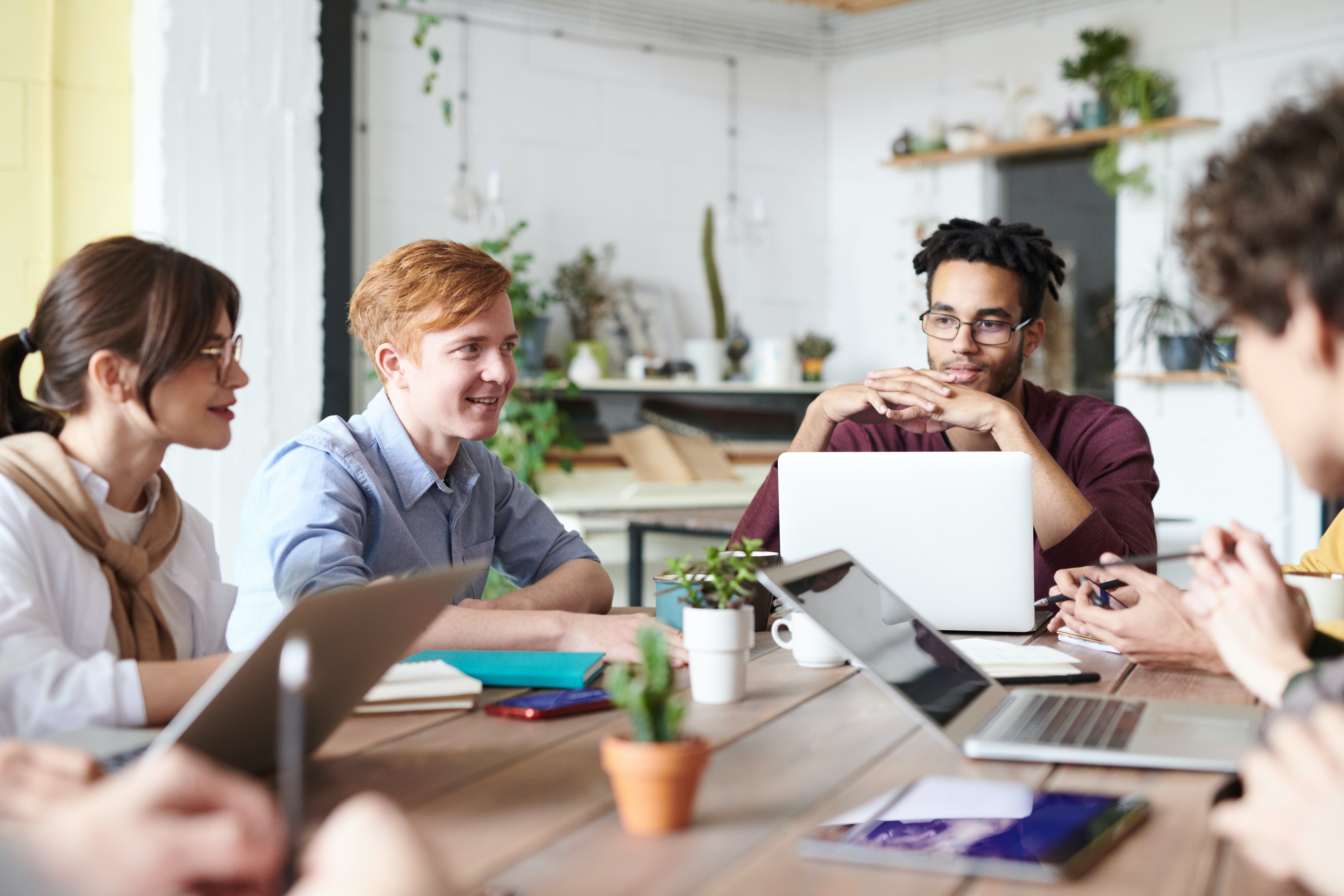 Group of people working together at a table