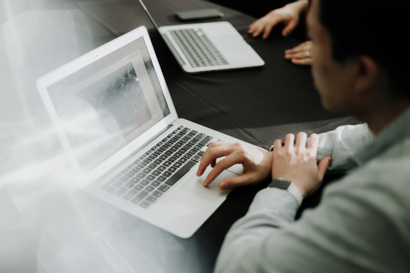 Person working on a laptop