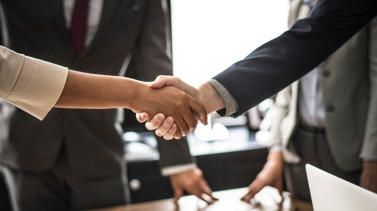 Two people shaking hands